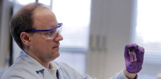 Study examines ‘extreme water stagnation’ in buildings shuttered by pandemic Andrew Whelton holds sample