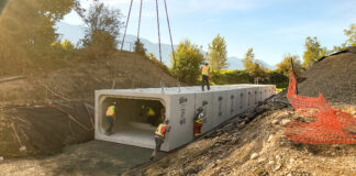 Precast concrete flood box saves BC town from floods Installation of box culvert pieces