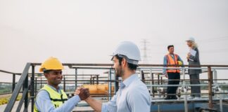 Engineers must play ‘crucial’ role in transition to net-zero emissions, says position paper engineering collaboration stock image