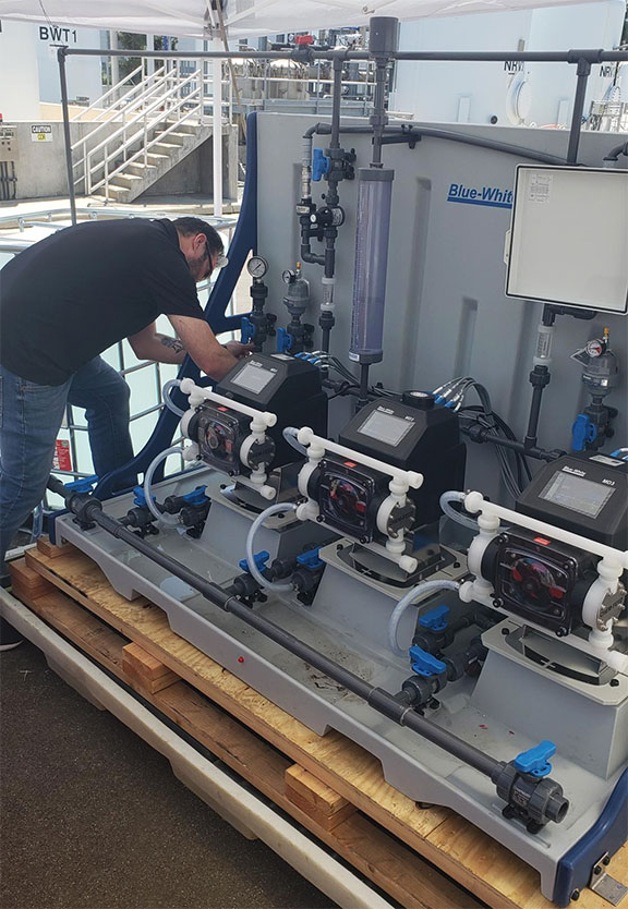BLUE-WHITE CHEM-FEED® CFPS-3-M Engineered Skid System CHEM-FEED® CFPS-3-M Engineered Skid System